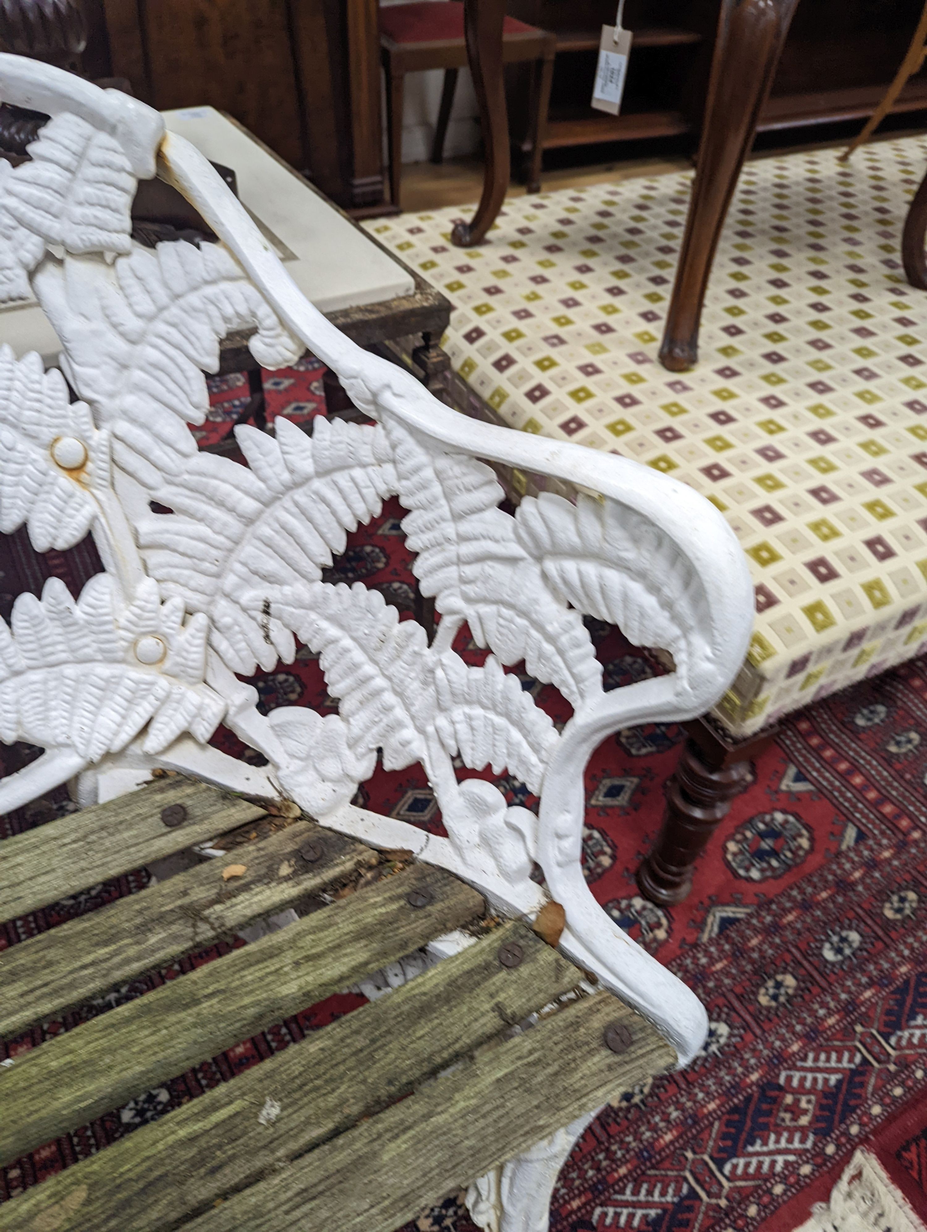 A Victorian Coalbrookdale design painted cast iron fern pattern garden bench, length 114cm, depth 44cm, height 90cm